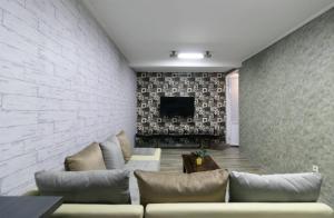 טלויזיה ו/או מרכז בידור ב-Vila Keluarga Syariah Mawar 82, Dago Resort 4BR dengan Privat Pool BBQ dan Rooftop