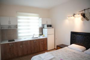 A kitchen or kitchenette at Sofia Residence