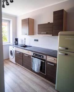 A kitchen or kitchenette at Cozy apartment in the city center of Kärdla