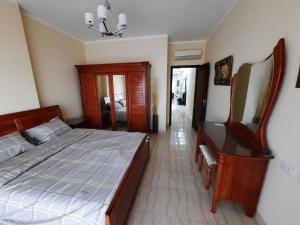 A bed or beds in a room at 2bedroom apartment in Hurghada