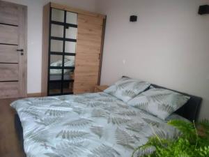 Vuode tai vuoteita majoituspaikassa Uniejów Apartament