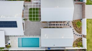 The swimming pool at or close to Brand new coastal oasis - family & pet friendly.