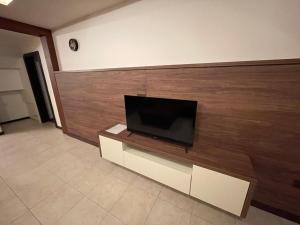 TV at/o entertainment center sa RRR Apartmány 3