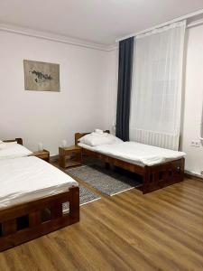 Krevet ili kreveti u jedinici u objektu Pataky Apartmanok