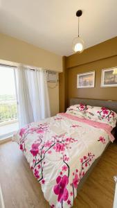 Rúm í herbergi á Verdon Parc 2BR Condotel Trevans