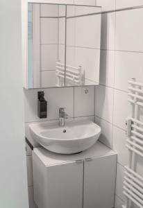 A bathroom at Studio Apartment am Kurpark