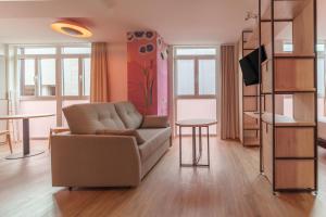 TV i/ili multimedijalni sistem u objektu Apartamentos Valladolid Centro