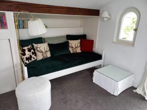 A bed or beds in a room at Landhaus Bellecôte