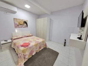 Televisi dan/atau pusat hiburan di Hotel Residencial Manaus - Flores