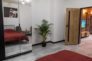 Giường trong phòng chung tại Apartament Black Loft