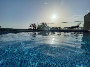 Piscina a AM Palace o a prop