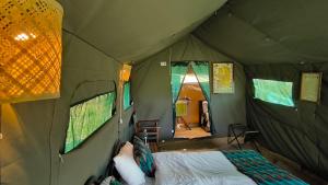 Телевізор і / або розважальний центр в Kananga Special Tented Camp