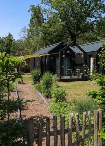 Κήπος έξω από το Kos I Tiny house met grote tuin