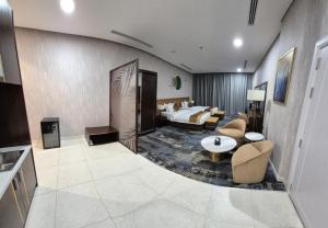 Leaf Suites أجنحة ليف tesisinde bir oturma alanı