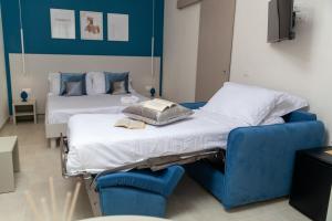 Tempat tidur dalam kamar di Altavilla Boutique Holidays House