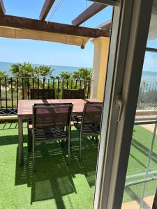 En balkon eller terrasse på LAS VISTAS, Isla Canela, Ayamonte