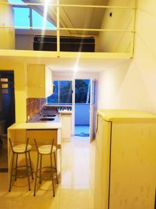 Apto estilo Loft encantador! Paz e linda vista 5 estrelas 주방 또는 간이 주방