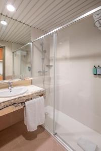 a bathroom with a shower and a sink at Hesperia Sant Joan in Sant Joan Despí