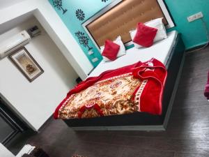 A bed or beds in a room at HOTEL 3 BS HOUSES dx