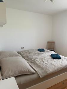 Rúm í herbergi á Ferienwohnung Wallner