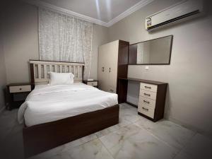 เตียงในห้องที่ فردان ريزيدانس - جدة Verdun Residence Jeddah