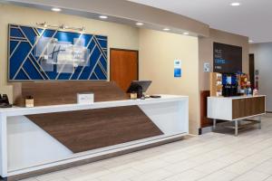 a lobby of a hospital with a reception desk at Holiday Inn Express Vancouver North, an IHG Hotel in Vancouver