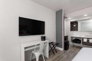 Televisor o centre d'entreteniment de Developer Inn Express Fundamental, a Travelodge by Wyndham