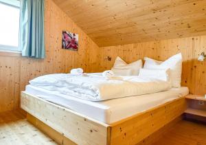 Lova arba lovos apgyvendinimo įstaigoje 1A Chalet Rast - Ski fahren, Traumblick, Indoor Sauna