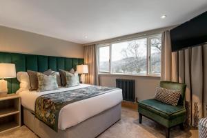 Ліжко або ліжка в номері Borrowdale Gates Hotel