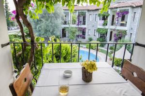 Ein Balkon oder eine Terrasse in der Unterkunft Olive Garden Apart Hotel