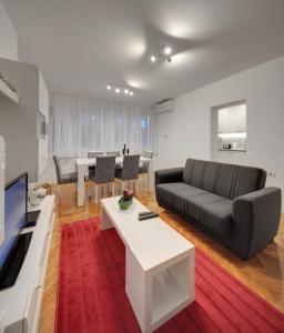 TV a/nebo společenská místnost v ubytování Apartment Osijek-Tvrda