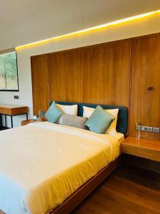 A bed or beds in a room at Teela- The Glamping Resort, Jaipur