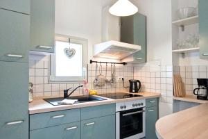 Una cocina o kitchenette en Ferienwohnung Am Nauener Tor