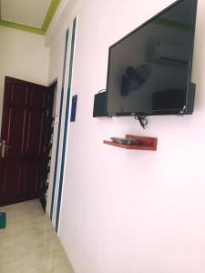 Een TV en/of entertainmentcenter bij Phan Rang Hotel
