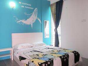 Vuode tai vuoteita majoituspaikassa MILU Homestay - Kuala Selangor