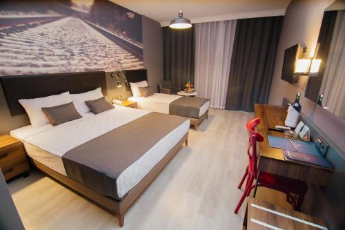 Krevet ili kreveti u jedinici u okviru objekta Ramira City Hotel - Adult Only (16+)