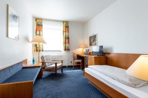 Un ou plusieurs lits dans un hébergement de l'établissement Trip Inn Hotel Frankfurt Airport Rüsselsheim