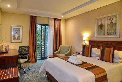 เตียงในห้องที่ City Lodge Hotel Fourways