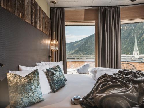 Vuode tai vuoteita majoituspaikassa Sieghard Suites Mayrhofen