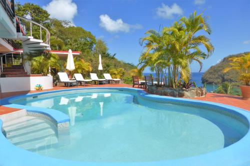 Poolen vid eller i närheten av Marigot Palms Luxury Caribbean Apartment Suites