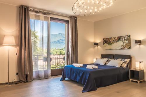 Una cama o camas en una habitación de Villa La Perla - Bellagio