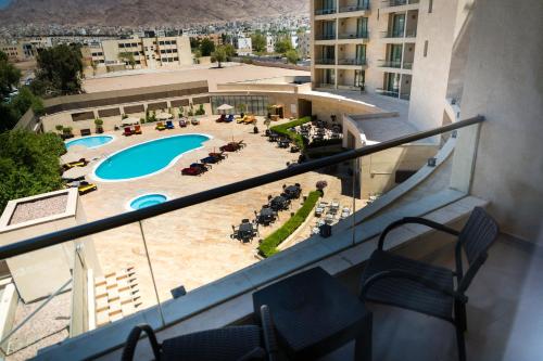 Bazén v ubytování Oryx Hotel Aqaba nebo v jeho okolí