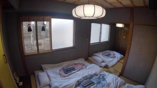 Katil atau katil-katil dalam bilik di Setouchi Triennale Hotel 403 Japanese style Art Female only - Vacation STAY 62544