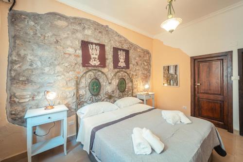 Posteľ alebo postele v izbe v ubytovaní Taormina Garden Hotel