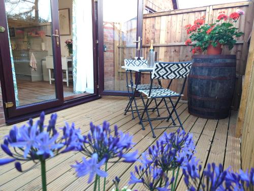 En balkon eller terrasse på Avocet Lodge, Snettisham