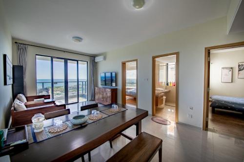 Krevet ili kreveti u jedinici u objektu Guanlan Pavilion Seaview Homestay