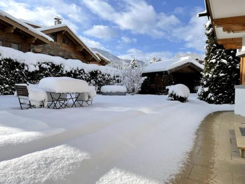 Das gemütliche Chalet im Bergdoktordorf Ellmau durante o inverno