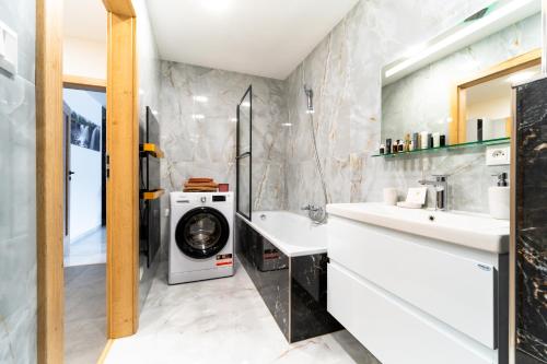 Apartmán Discreet tesisinde bir banyo