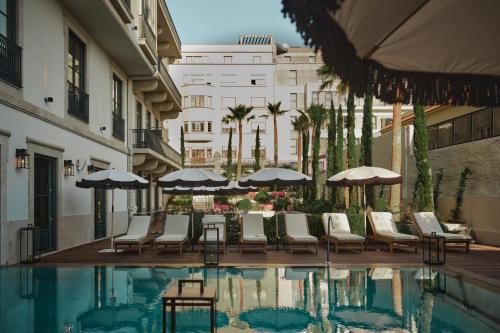 The swimming pool at or close to GA Palace Hotel & Spa, a XIXth-Century Villa