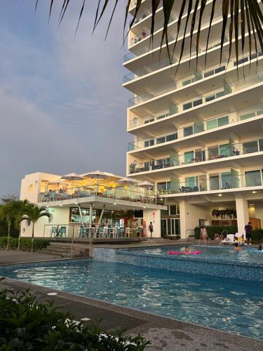 Swimming pool sa o malapit sa Resort Playa Azul Departamentos frente al mar